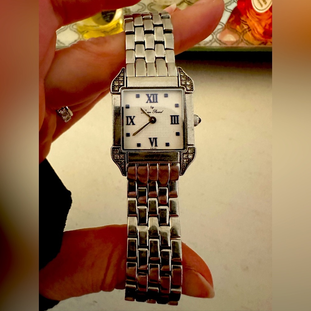 Lucien Piccard Watch with Diamond and sapphire dial.